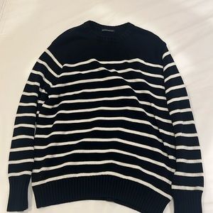 Brandy Melville navy sweater with white stripes.